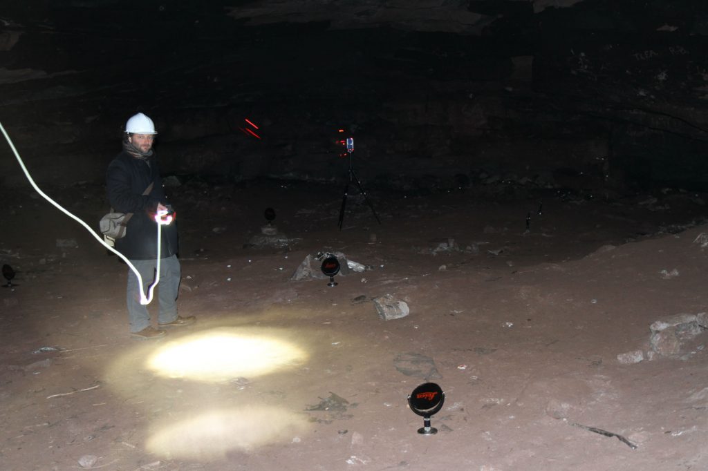 The process of laser scanning captured in this spooky image taken in the dark cave space of the Well Cave