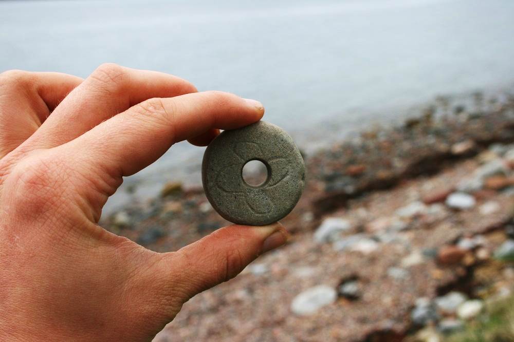Decorated spindle whorl found amongst shell middens in the coast edge