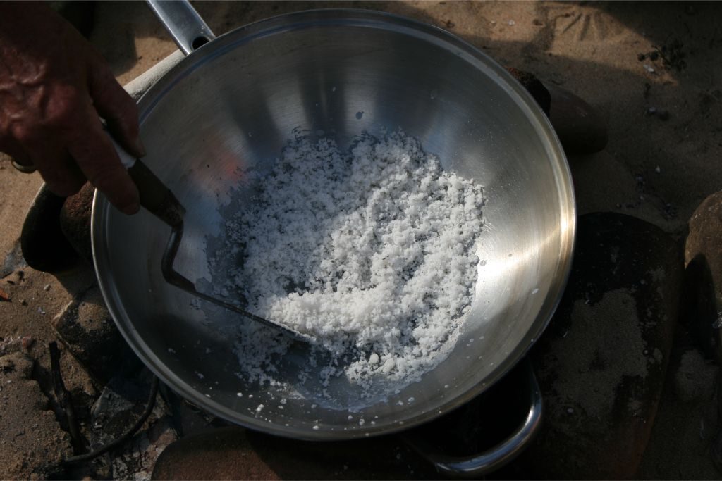 Salt crystals in a large metal pan