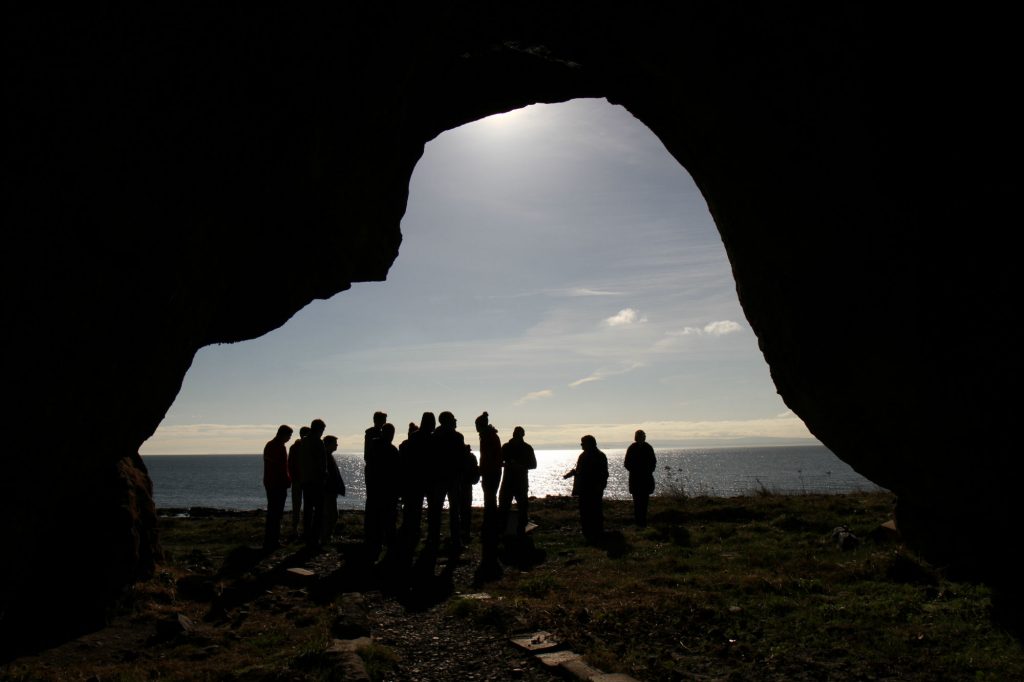 Fielwork coincided with the solar eclipse in March. Here, the moment of maximum eclipse captured with students from Dunfermline College in front of the Doo Cave 