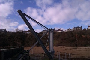 Crail harbour hand crane with beach in the background, looking NW