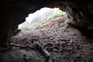 East Archerfield cave with sand at entrance