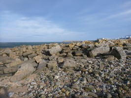 Skateraw Harbour showing dressed stone in masonry pile. By Laurens McGregor