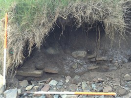 12784 Bur Ness detail of stone overlying peat ash