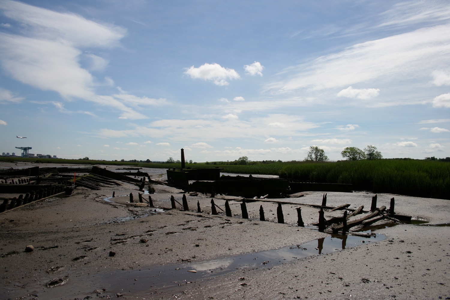 Newshot Island ship graveyard showing the dredger, some of the surrounding punts and the coast edge
