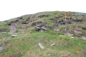 Noup mound iii showing the stonework exposed in the seaward side 