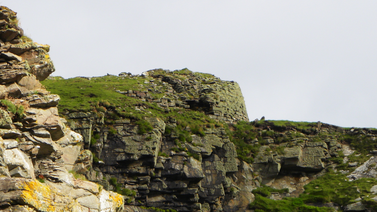 Showing the broch on the cliffs