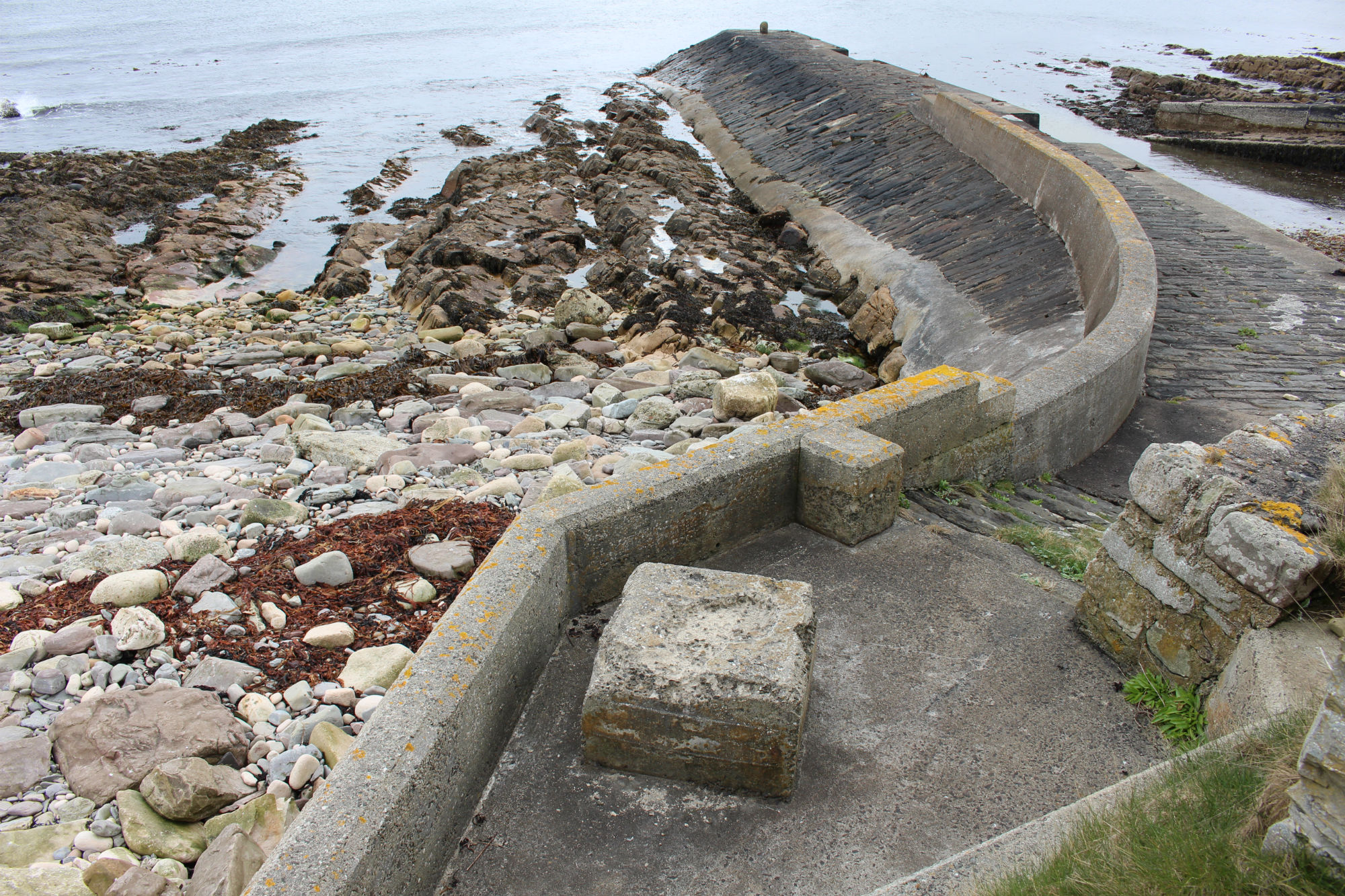 Upper end of pier and steps to storehouse building