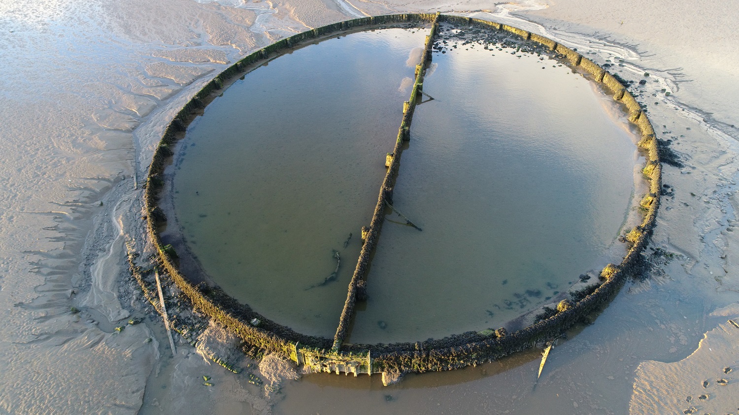 Oblique aerial view of pool showing sluice gates on south side