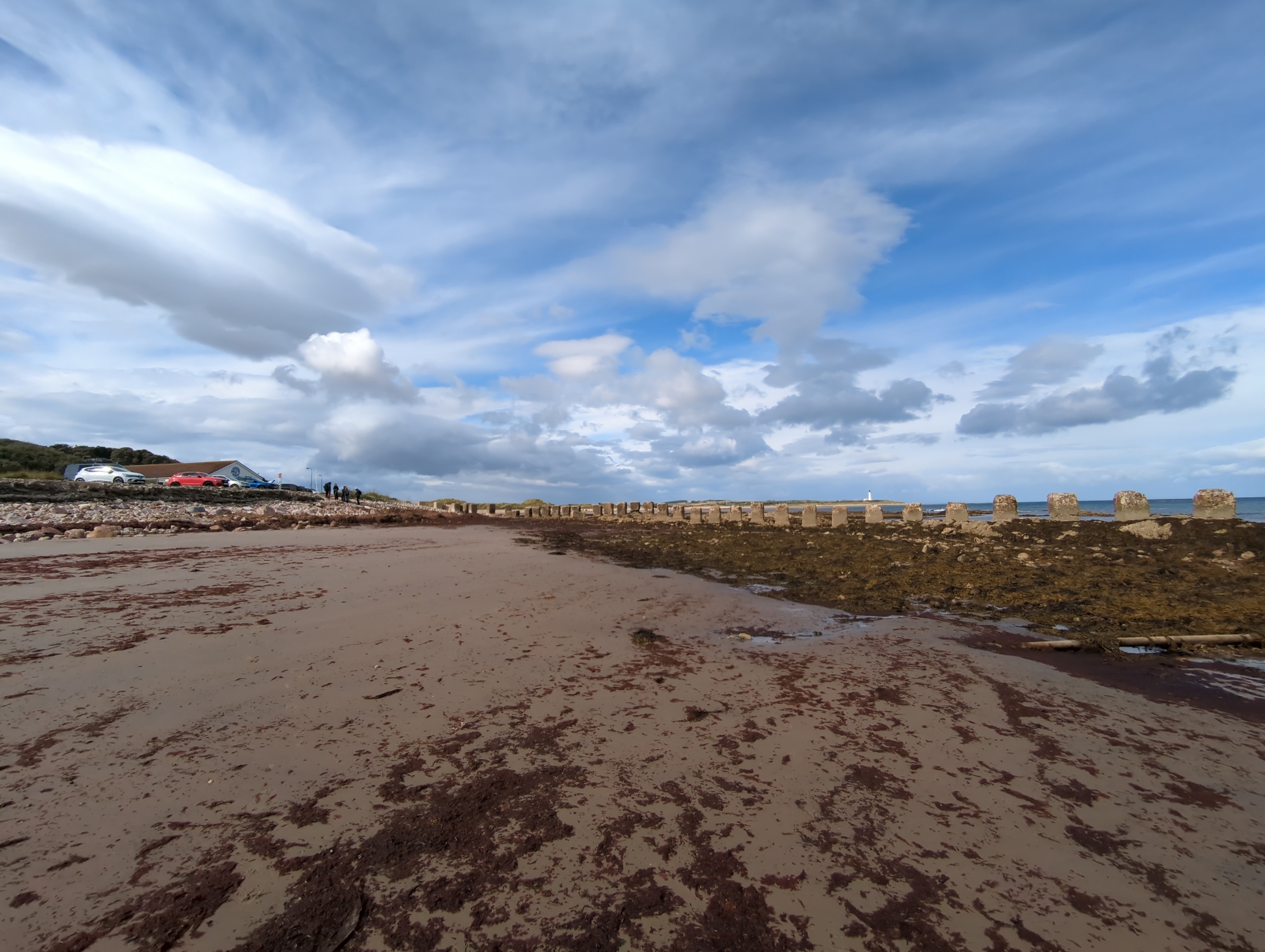 Anti-tank blocks at east (car park) end of West Beach, looking west