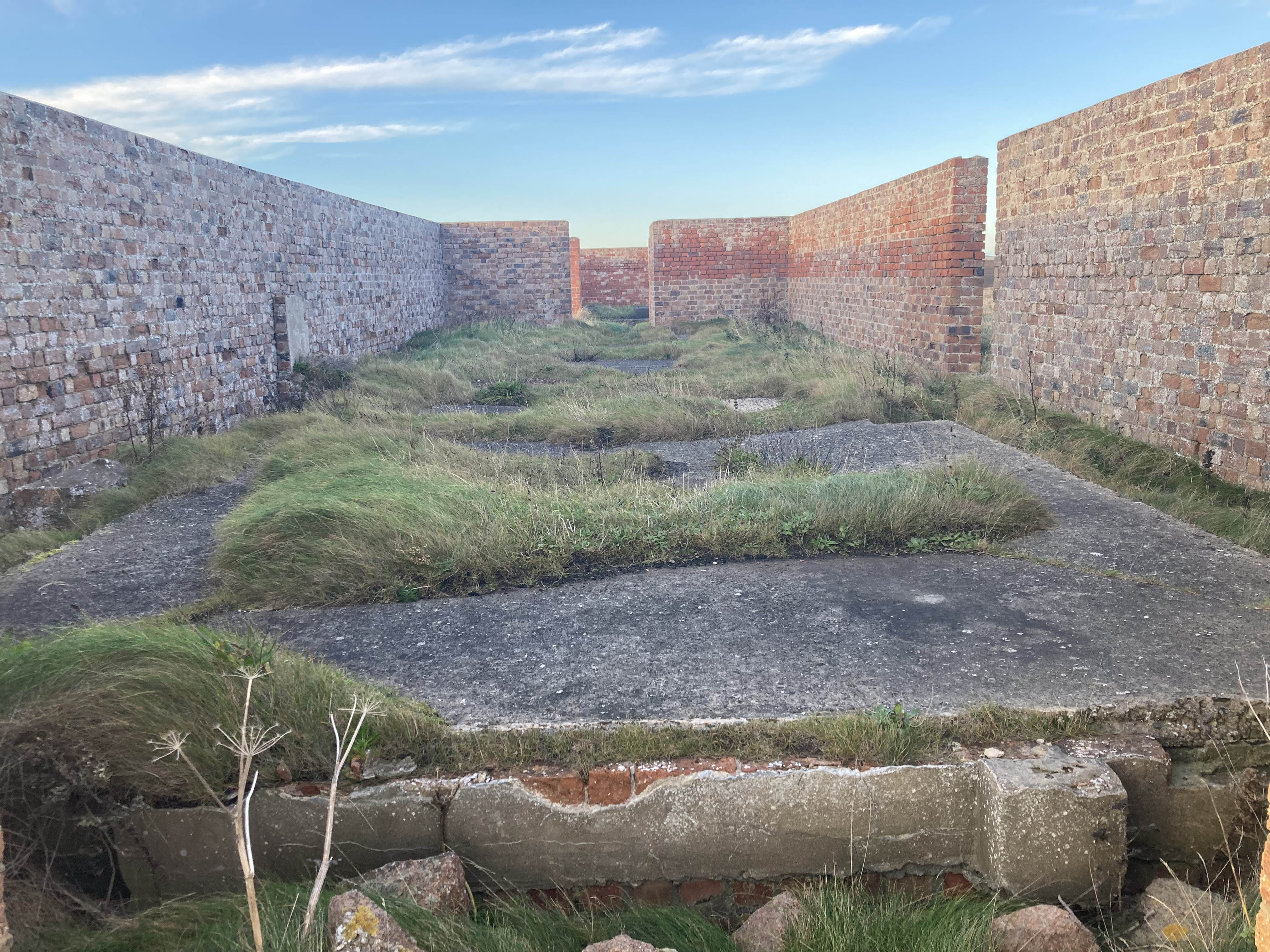 Looking north through the red brick walled enclosures.