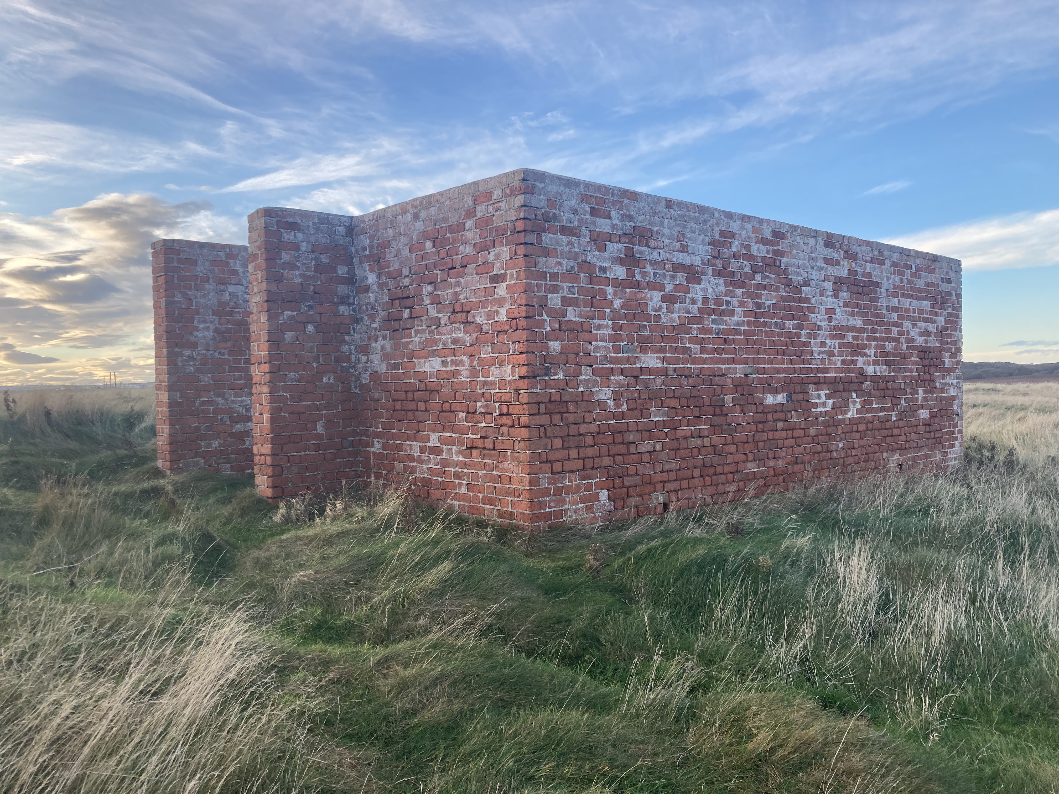 Northern most of two red brick walled structures. Looking north west.