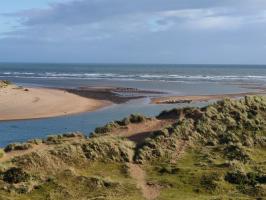 Pill box and anti tank cubes photographed from the Newburgh side of the Ythan estuary.