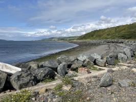 General view of coastline, looking north. Reinforced concrete structure used within rock armour defence.