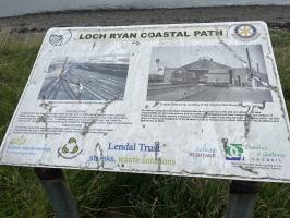 Information board at Lefnoll Point showing photographs of military railway when in use.