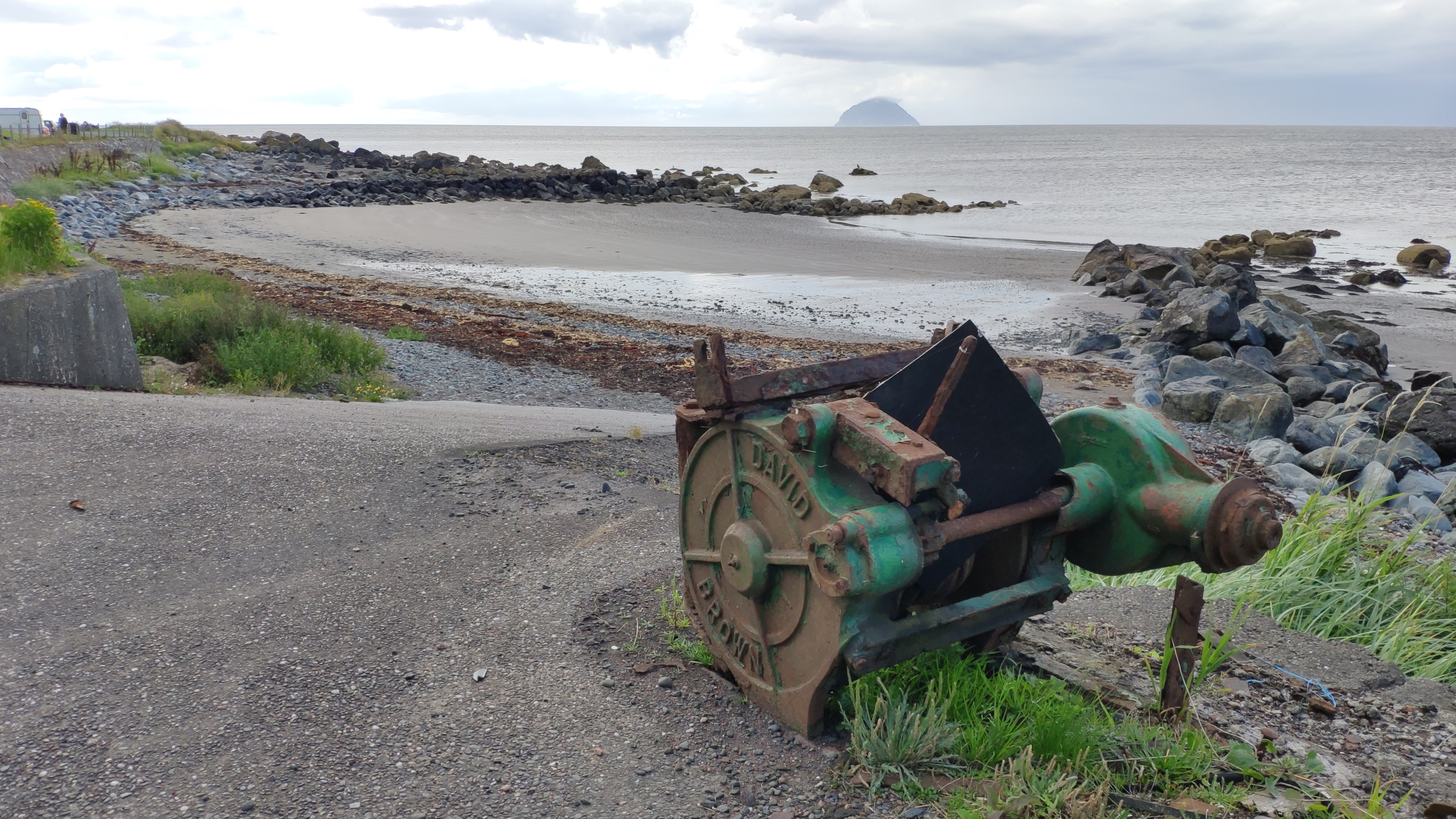 Winch on coast edge by slipway and cleared landing place visible in background.