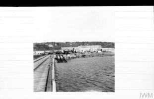 Innermessan slipway and workshops from jetty. Courtesy of Imperial War Museum. Photographer: Sergeant Palmer.
1944-09-16 © IWM H 40156