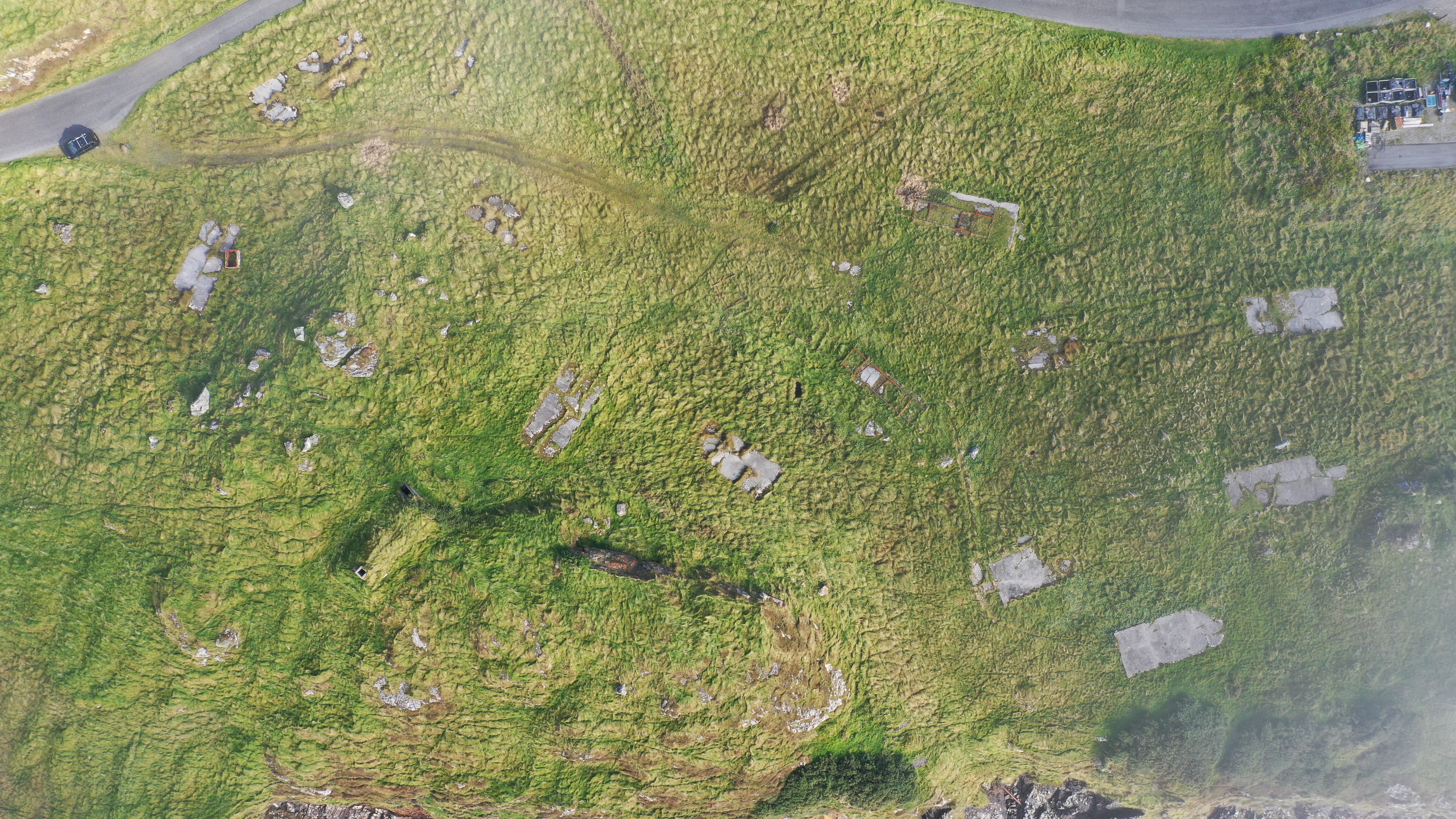 Aerial view of the Rodel Park accommodation block. The concrete hard standing for five Nissen huts are visible, as well as the air shaft for the air raid shelter in the bottom right.
